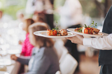 Sit-down dinner service by a professional event caterer in Boca Raton