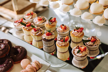 Wedding caterer in Boca Raton setting up dessert station for guests